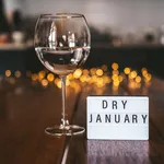 Challenge dry January. Wine glass with water. 